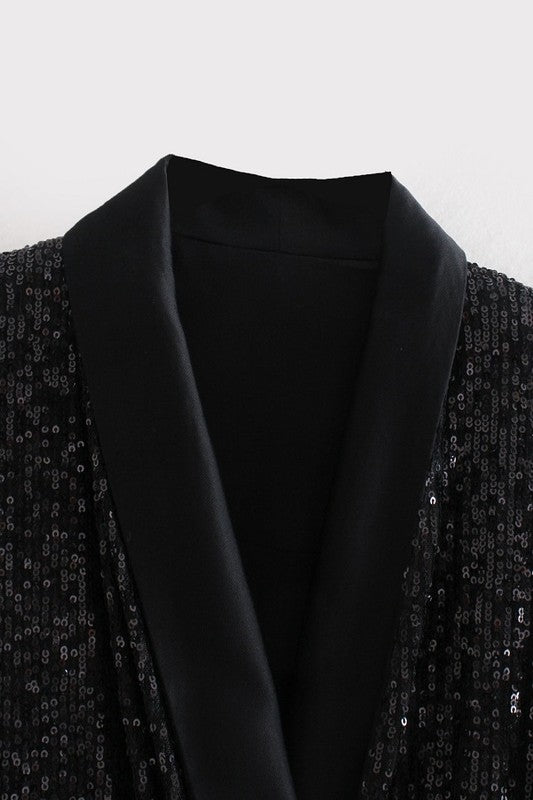 Black Sequin blazer.